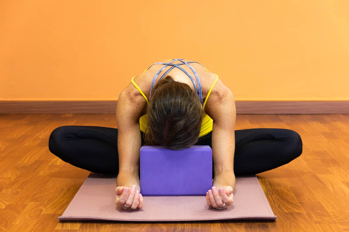 Woman,In,Butterfly,Yin,Yoga,Asana,With,Forehead,Resting,On